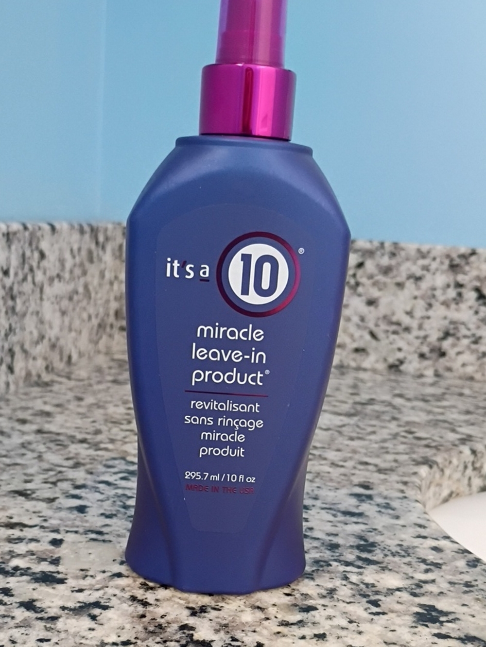 It's a 10 Miracle Leave-In Product — Navy Bottle with Pink Pump